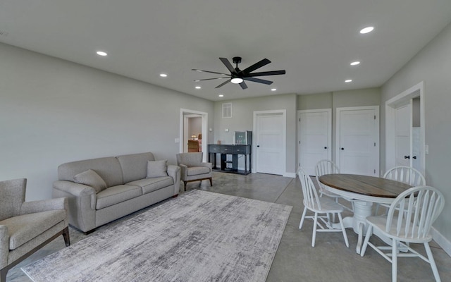 433 Hawkeye Trl, Marble, NC 28905 - living room featuring recessed lighting, a ceiling fan, visible vents, baseboards, and finished concrete flooring
