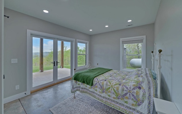 433 Hawkeye Trl, Marble, NC 28905 - bedroom with finished concrete flooring, visible vents, access to exterior, baseboards, and recessed lighting