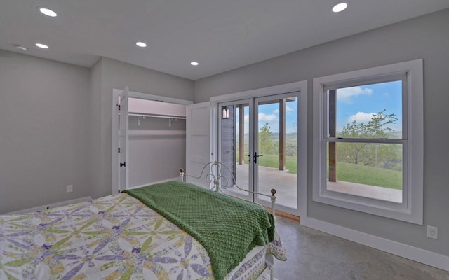 433 Hawkeye Trl, Marble, NC 28905 - bedroom with recessed lighting, access to exterior, baseboards, concrete flooring, and french doors