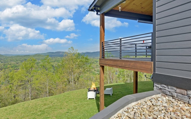 433 Hawkeye Trl, Marble, NC 28905 - view of yard with a mountain view, an outdoor fire pit, and a view of trees