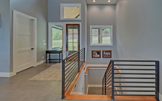 433 Hawkeye Trl, Marble, NC 28905 - stairs featuring a towering ceiling, recessed lighting, and baseboards