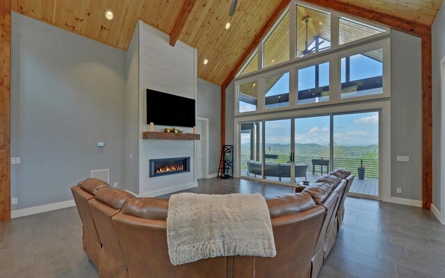 433 Hawkeye Trl, Marble, NC 28905 - living room with baseboards, high vaulted ceiling, wooden ceiling, and a glass covered fireplace