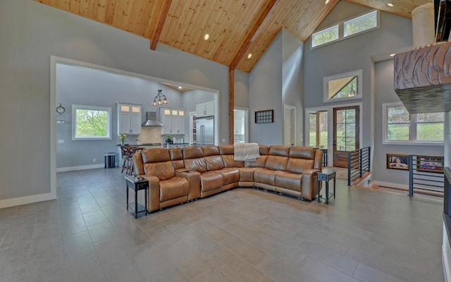 433 Hawkeye Trl, Marble, NC 28905 - living area featuring high vaulted ceiling, beamed ceiling, an inviting chandelier, and wood ceiling