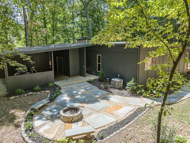 view of patio / terrace with an outdoor fire pit