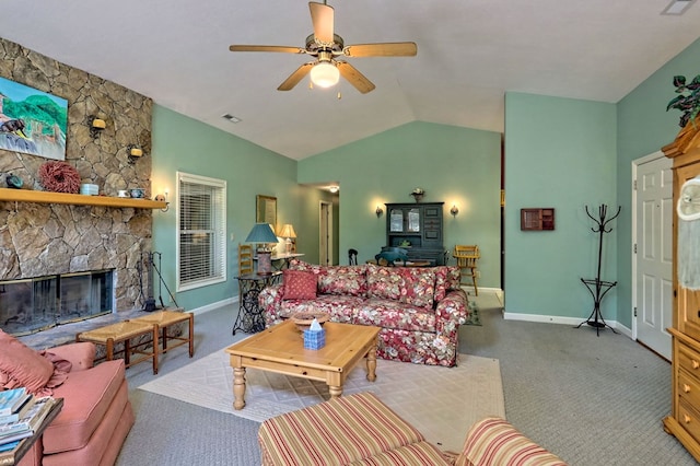 carpeted living room featuring ceiling fan, lofted ceiling, and a fireplace