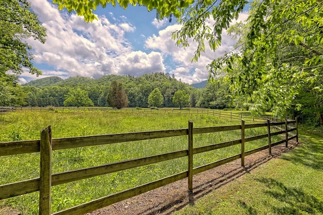 view of gate featuring a rural view