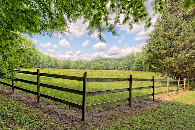 view of gate featuring a rural view