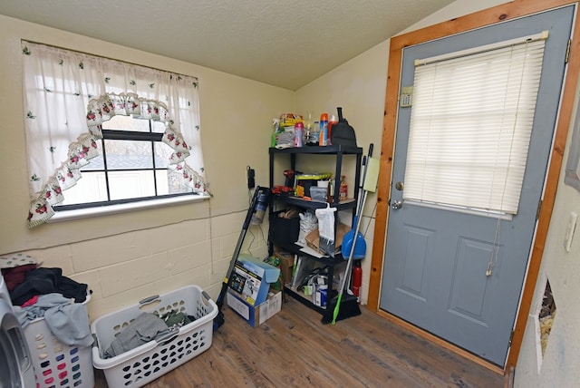 game room featuring dark hardwood / wood-style flooring and vaulted ceiling