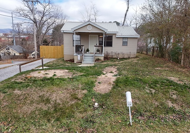 view of front of home with a front lawn