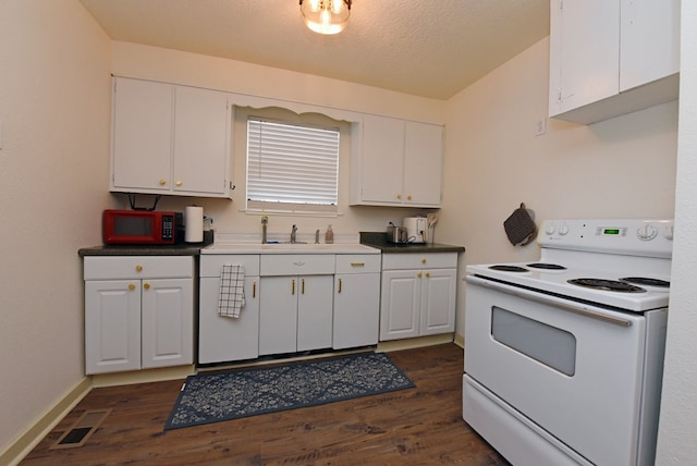 kitchen featuring a textured ceiling, dark hardwood / wood-style floors, white cabinetry, and white electric stove