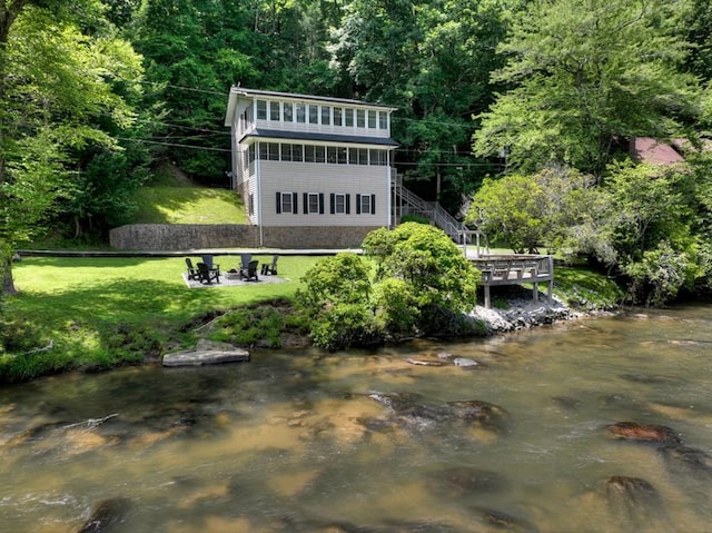 exterior space with a water view