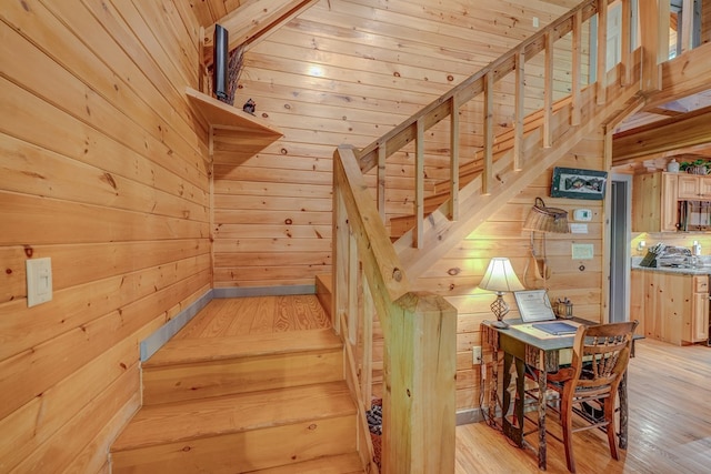 56 Laurel Dr, Blue Ridge, GA 30513 - stairway with wood walls and wood-type flooring