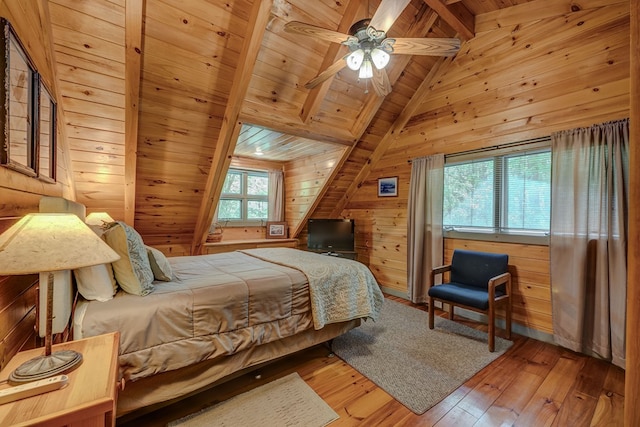 56 Laurel Dr, Blue Ridge, GA 30513 - bedroom with hardwood / wood-style flooring, wood walls, wood ceiling, and a ceiling fan