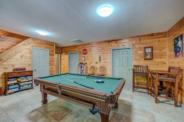56 Laurel Dr, Blue Ridge, GA 30513 - rec room featuring wood walls, a textured ceiling, pool table, and light stone finish flooring