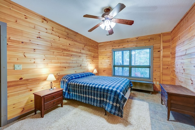 56 Laurel Dr, Blue Ridge, GA 30513 - bedroom featuring wooden walls and ceiling fan