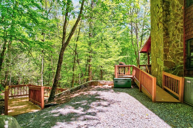 56 Laurel Dr, Blue Ridge, GA 30513 - view of yard featuring a wooden deck and a view of trees