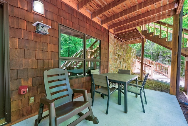 56 Laurel Dr, Blue Ridge, GA 30513 - view of patio / terrace featuring fence, outdoor dining area, and stairs