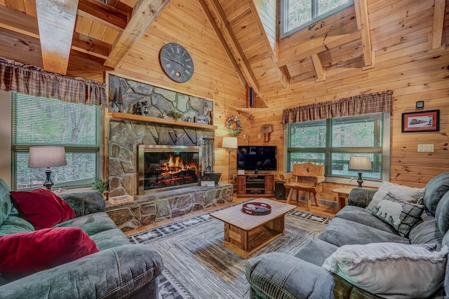 56 Laurel Dr, Blue Ridge, GA 30513 - living room with wood ceiling, beam ceiling, wooden walls, wood finished floors, and a fireplace