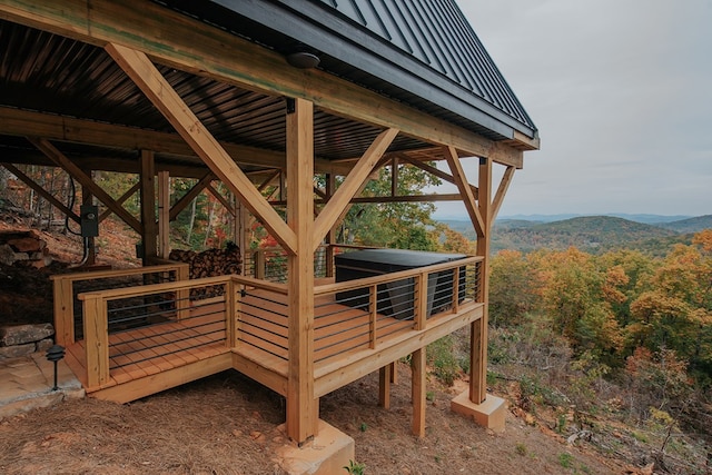 wooden terrace with a mountain view