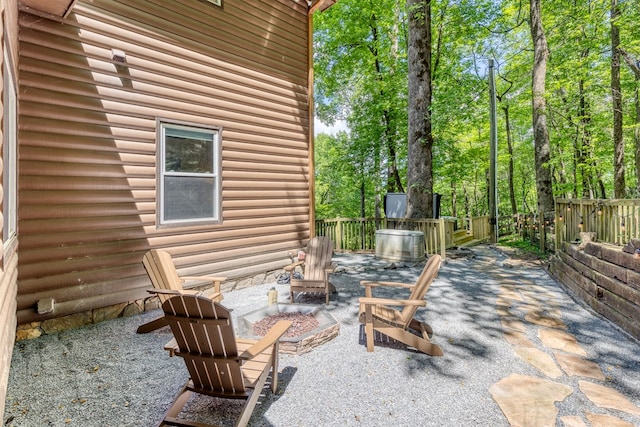 view of patio / terrace featuring a fire pit