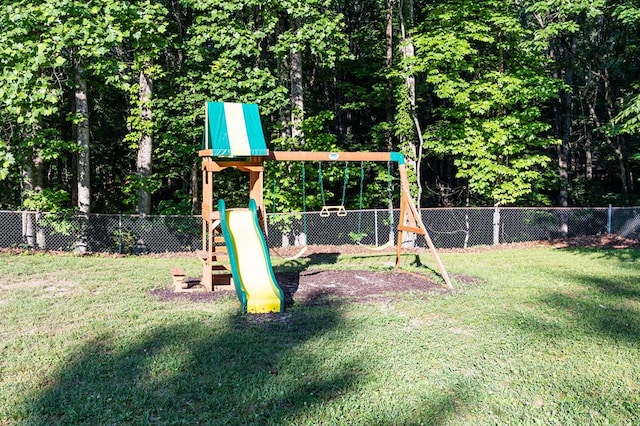 view of jungle gym featuring a yard