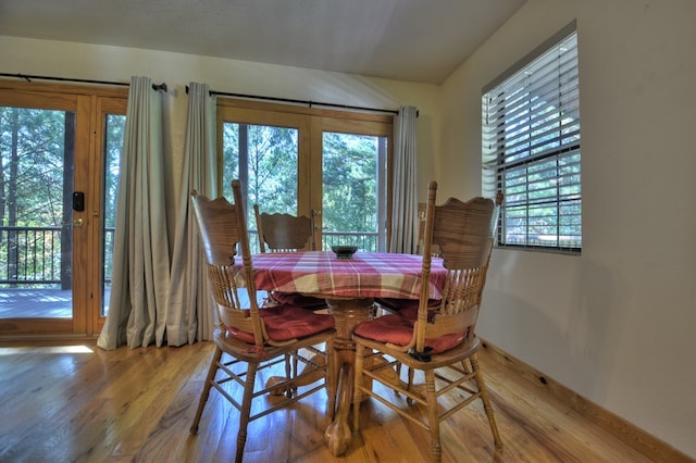 dining room with light wood-type flooring