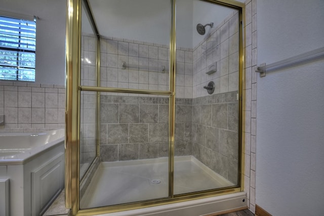 bathroom featuring a stall shower