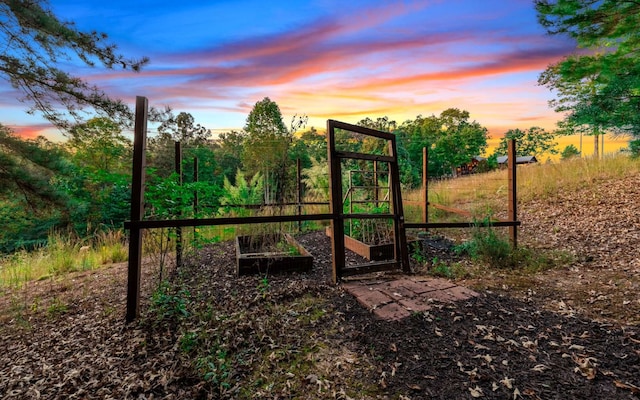 view of gate at dusk