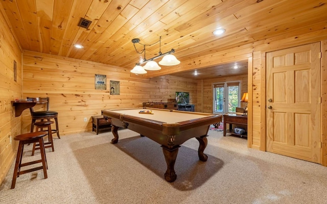 rec room with wooden ceiling, light colored carpet, wood walls, and pool table