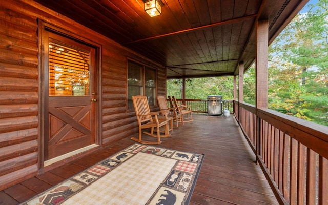 wooden terrace featuring a porch