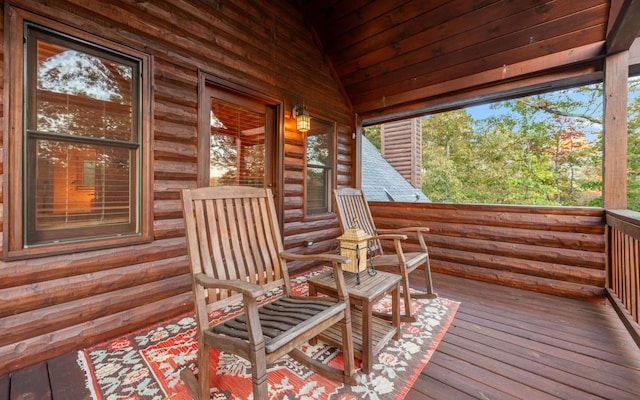 wooden terrace featuring a porch