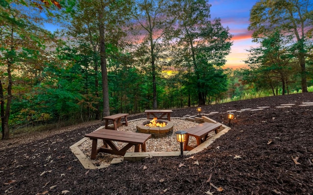 view of patio terrace at dusk