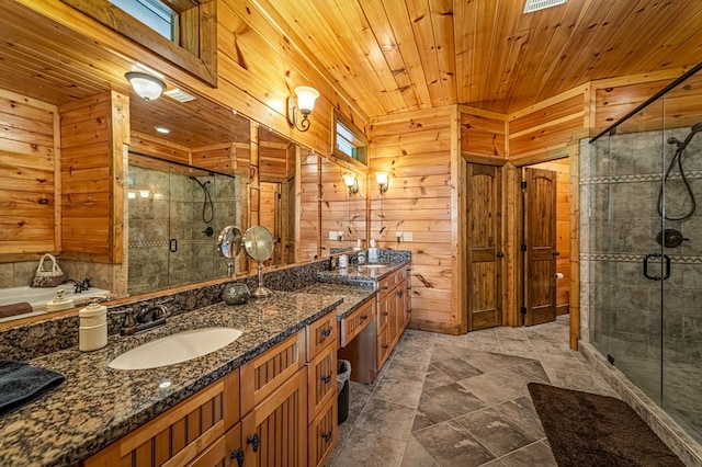 bathroom featuring double vanity, wood ceiling, a sink, and a stall shower