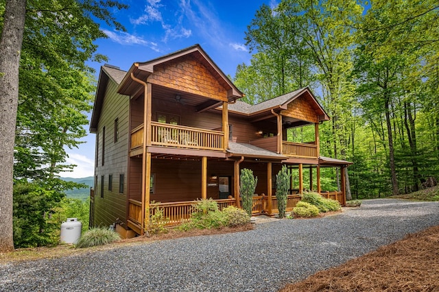 view of front of house featuring a porch and a balcony