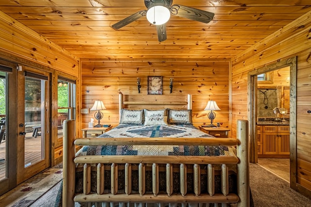 bedroom with wooden walls, access to outside, and wooden ceiling