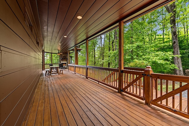 deck with outdoor dining area