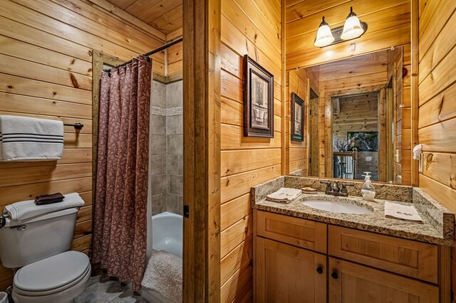full bathroom with vanity, wood walls, shower / bath combination with curtain, and toilet