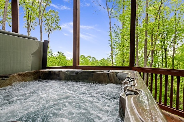 exterior details with a hot tub