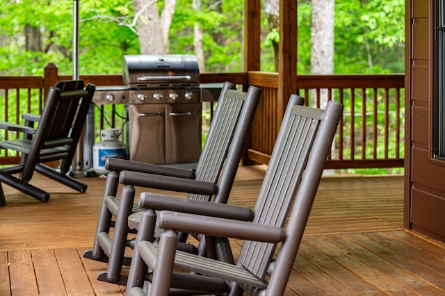 wooden deck with area for grilling