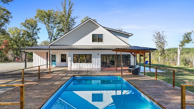 rear view of property featuring a patio area