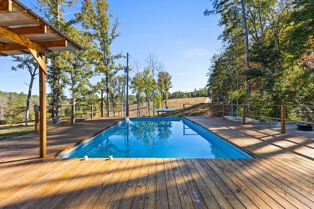 view of pool with a deck