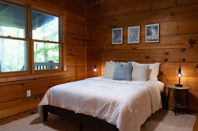 365 Browns Cove Rd, Blue Ridge, GA 30513 - bedroom featuring wood walls and wood finished floors