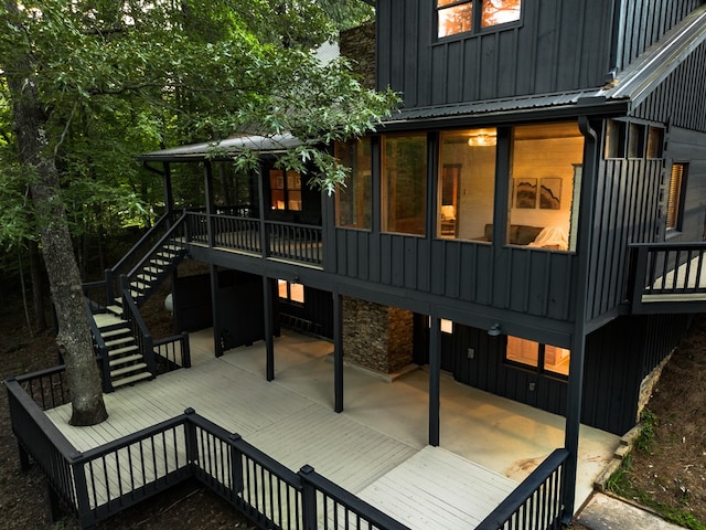 365 Browns Cove Rd, Blue Ridge, GA 30513 - back of house featuring board and batten siding, stairs, a deck, and stone siding