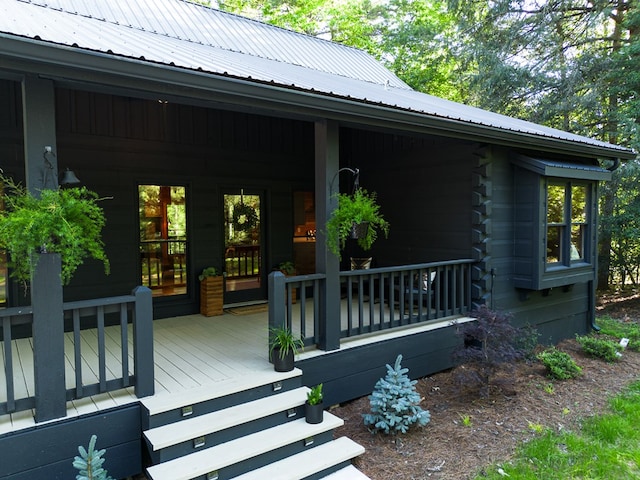 365 Browns Cove Rd, Blue Ridge, GA 30513 - view of exterior entry with metal roof and covered porch
