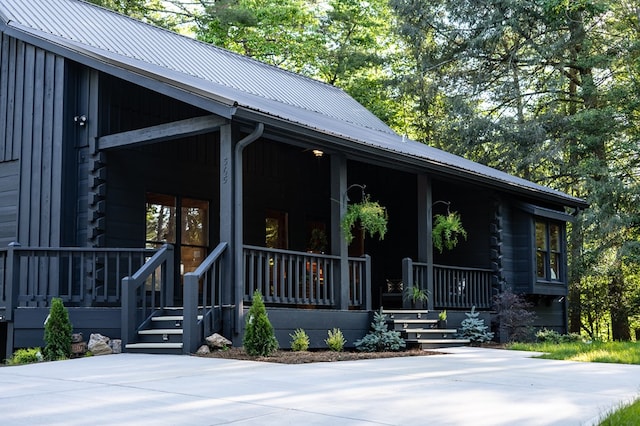 365 Browns Cove Rd, Blue Ridge, GA 30513 - property entrance with covered porch and metal roof