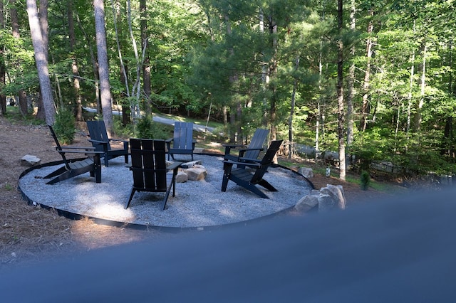 365 Browns Cove Rd, Blue Ridge, GA 30513 - view of patio with a fire pit and a wooded view