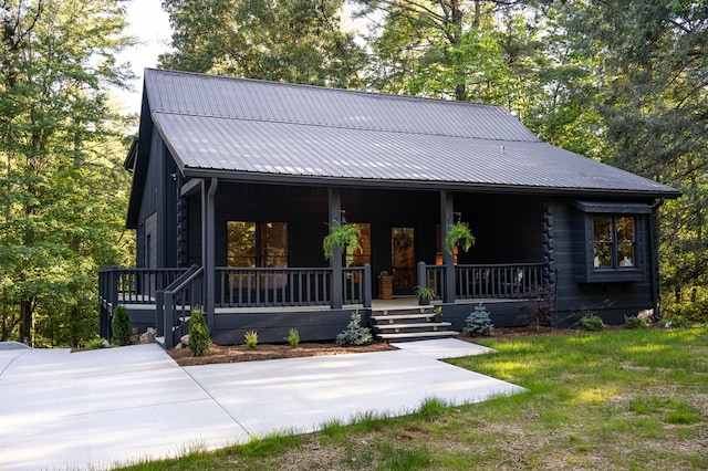 365 Browns Cove Rd, Blue Ridge, GA 30513 - view of front of house with a porch and metal roof