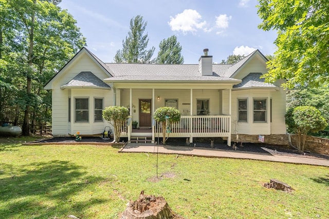 904 Villa Dr, Ellijay, GA 30540 - view of front of home with a porch, a chimney, a front lawn, and roof with shingles