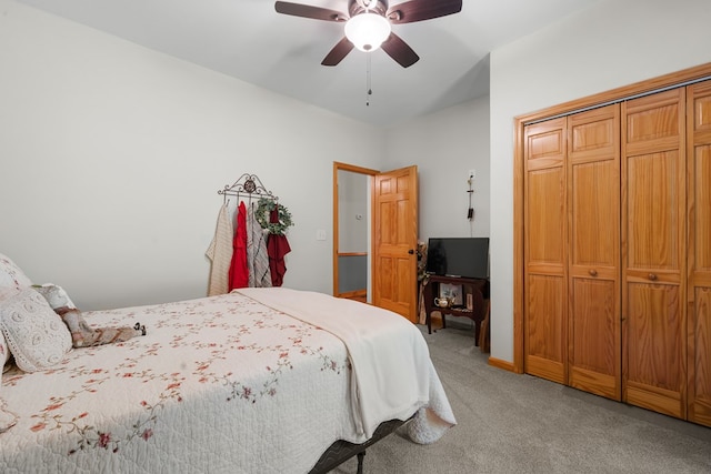 904 Villa Dr, Ellijay, GA 30540 - bedroom with light carpet, a closet, and a ceiling fan