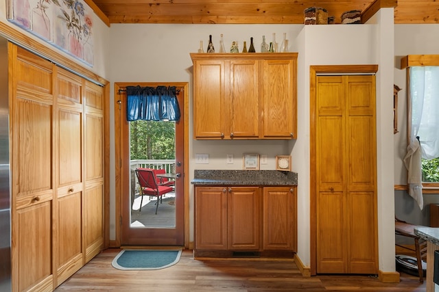904 Villa Dr, Ellijay, GA 30540 - kitchen with wood finished floors and dark stone countertops